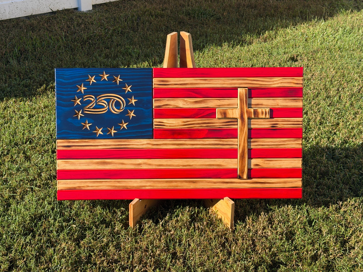Front view of wooden American flag with raised cross and 250 anniversary design surrounded by stars